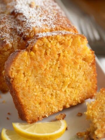 carrot and coconut cake sliced and showing the moist crumb.