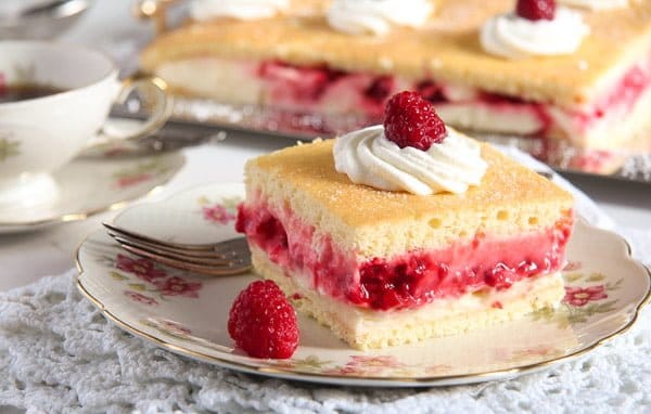 lemon cake with curd and raspberries