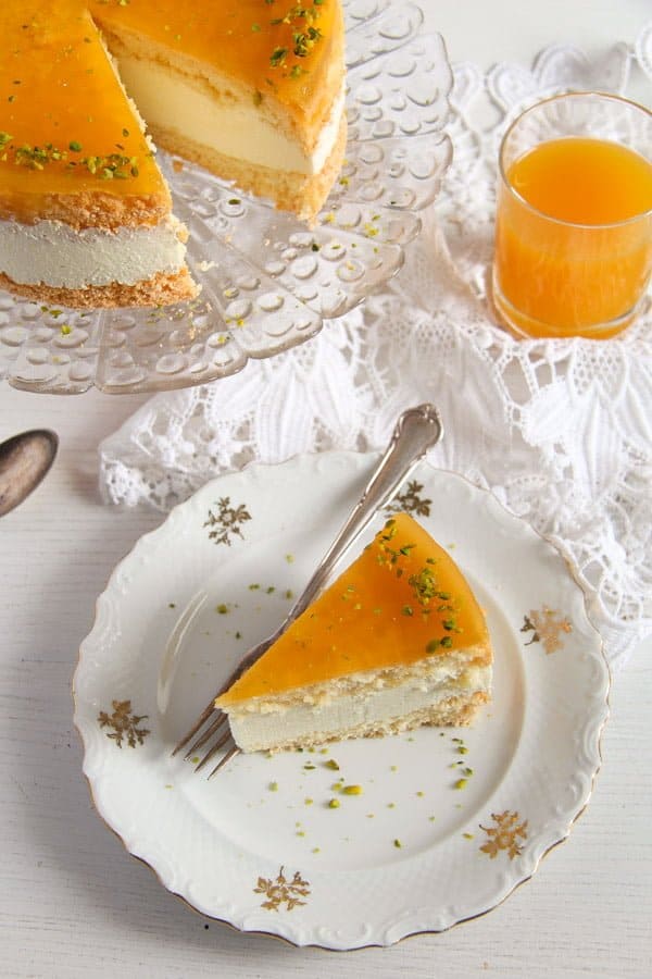 cheesecake maracuya sliced on a small vintage plate