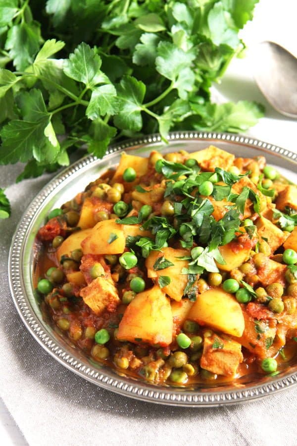 vegan potato curry with tofu and peas