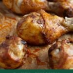 oven baked chicken drumsticks on a baking tray