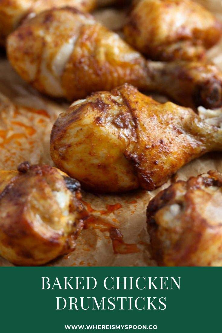 oven baked chicken drumsticks on a baking tray