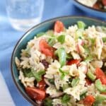 pinterest image with title for potluck pasta salad, greek-style.
