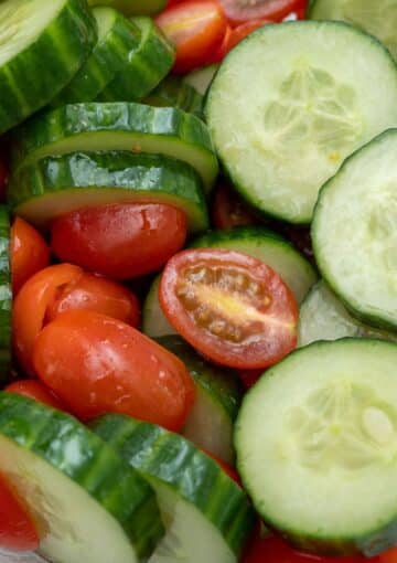 chopped tomatoes and cucumbers close up.