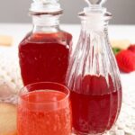 canning strawberry syrup in bottles for making drinks