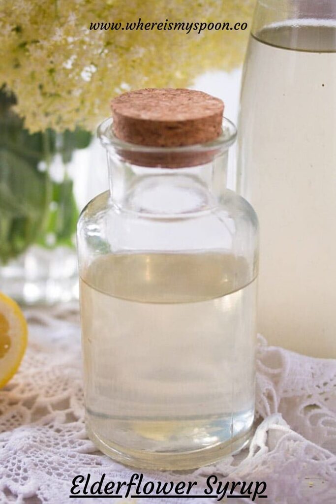 corked bottle of elderflower syrup