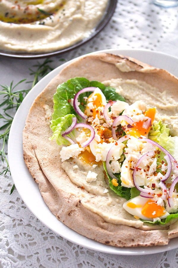 flatbread with fava beans and eggs