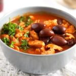 moroccan chicken stew with olives and ras-el-hanout in a bowl