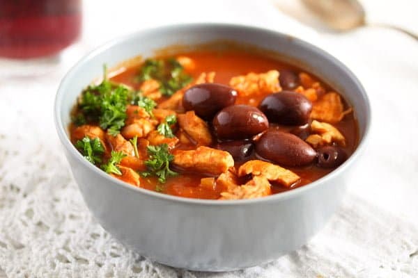 moroccan chicken stew with olives and ras-el-hanout in a bowl