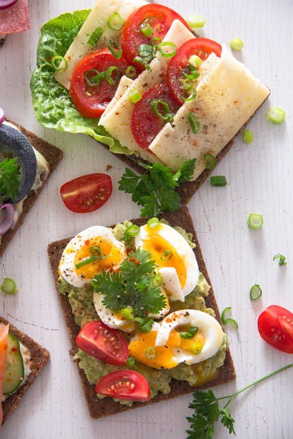  Smørrebrød sandwiches with eggs and cheese