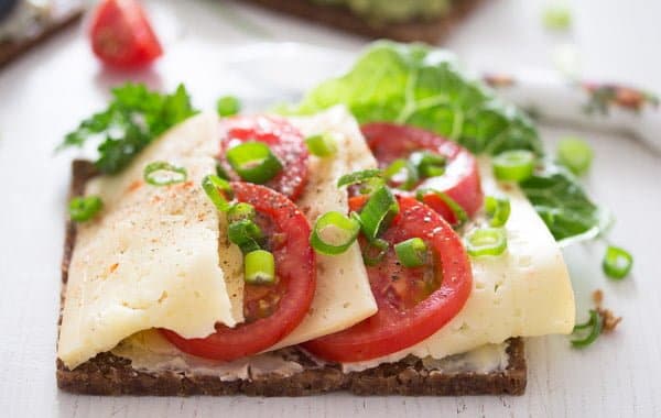 Smørrebrød with cheese and tomatoes