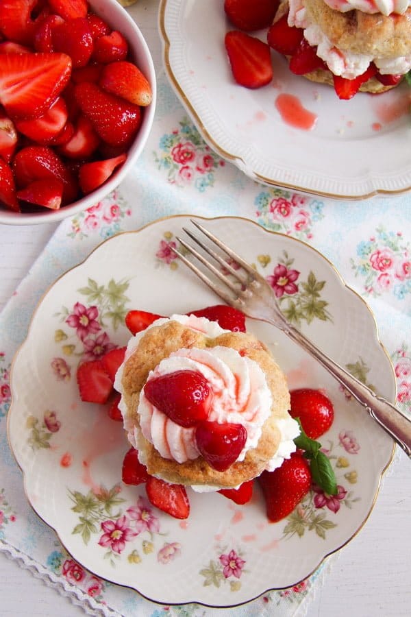 shortcake biscuits with berries and cream seen from above