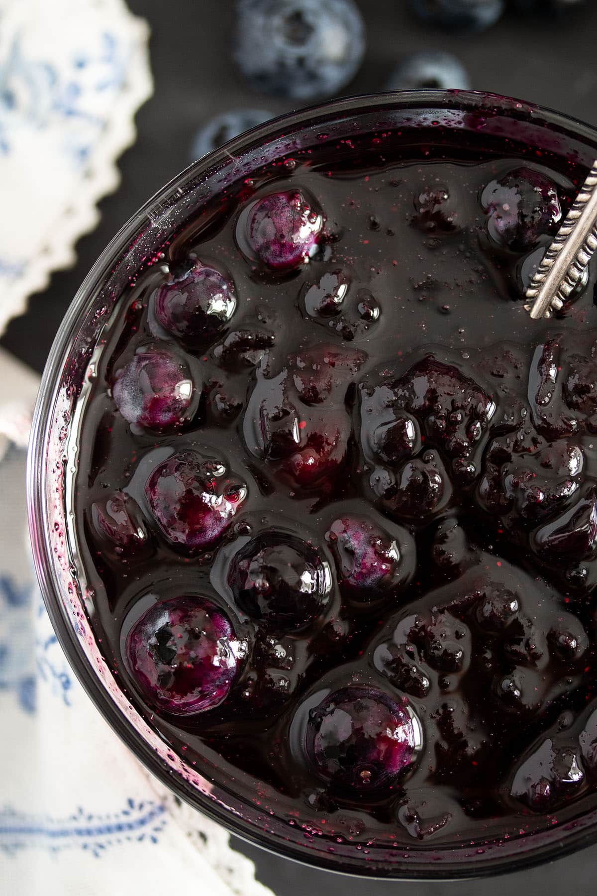glossy blueberry sauce in a jar.