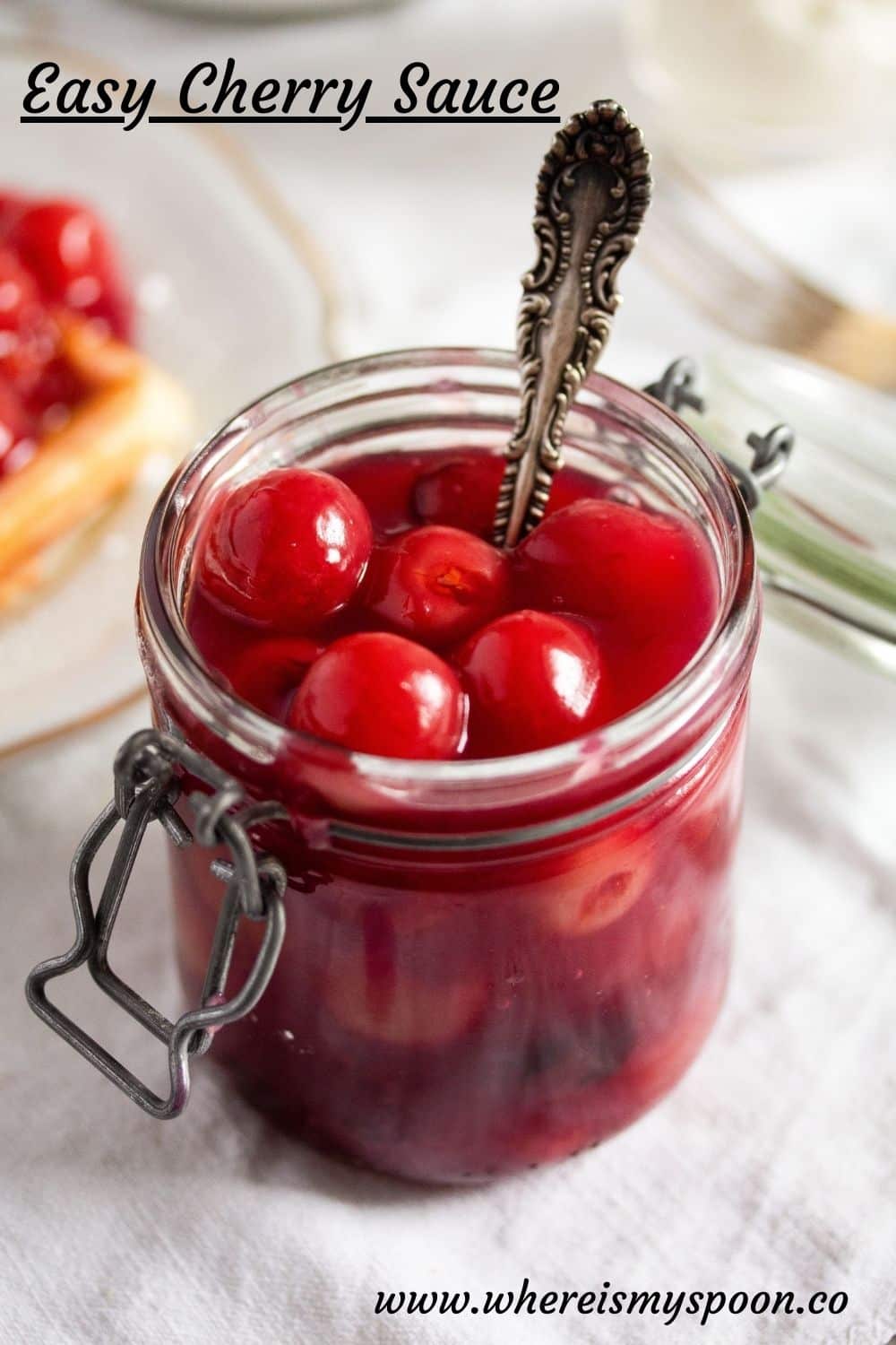 homemade cherry sauce in a jar