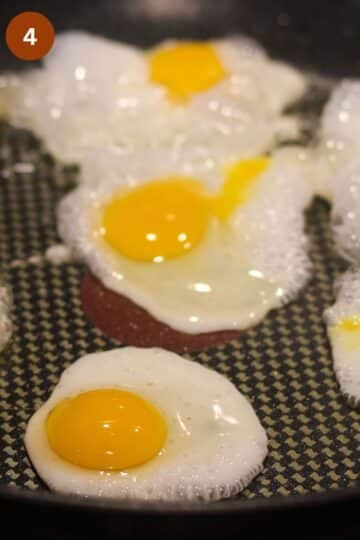 fried eggs in a frying pan.