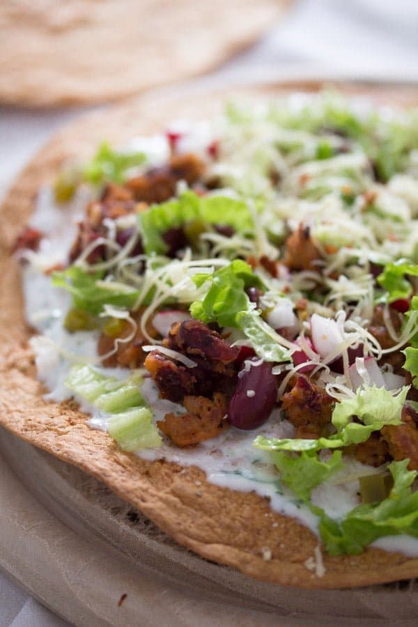 tostadas with chorito and beans