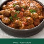 small bowl of tapa meatballs with sauce.
