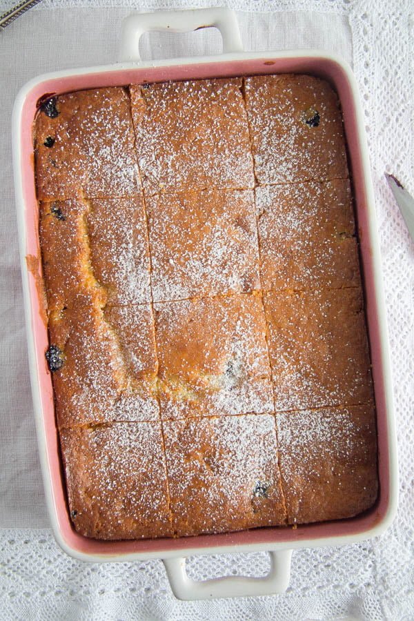 blueberry sour cream cake in a casserole dish