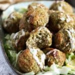 pin image with the title broccoli cauliflower bites.