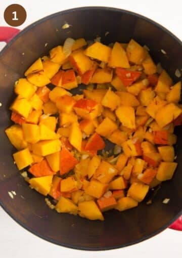sauteing hokkaido pieces in a pot for making pasta sauce.