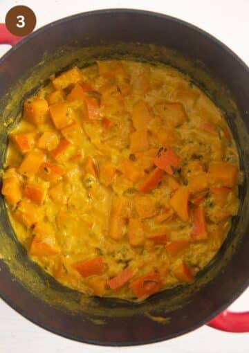 hokkaido pieces cooking in sauce in a pot.