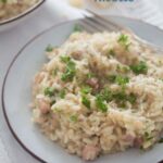 easy risotto with leftover meat and parmesan on a plate