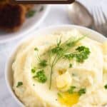 pinterest image with title for garlic parmesan mashed potatoes.