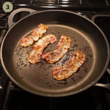 frying four slices of bacon in a frying pan.