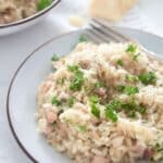 pinterest image with title for turkey risotto.