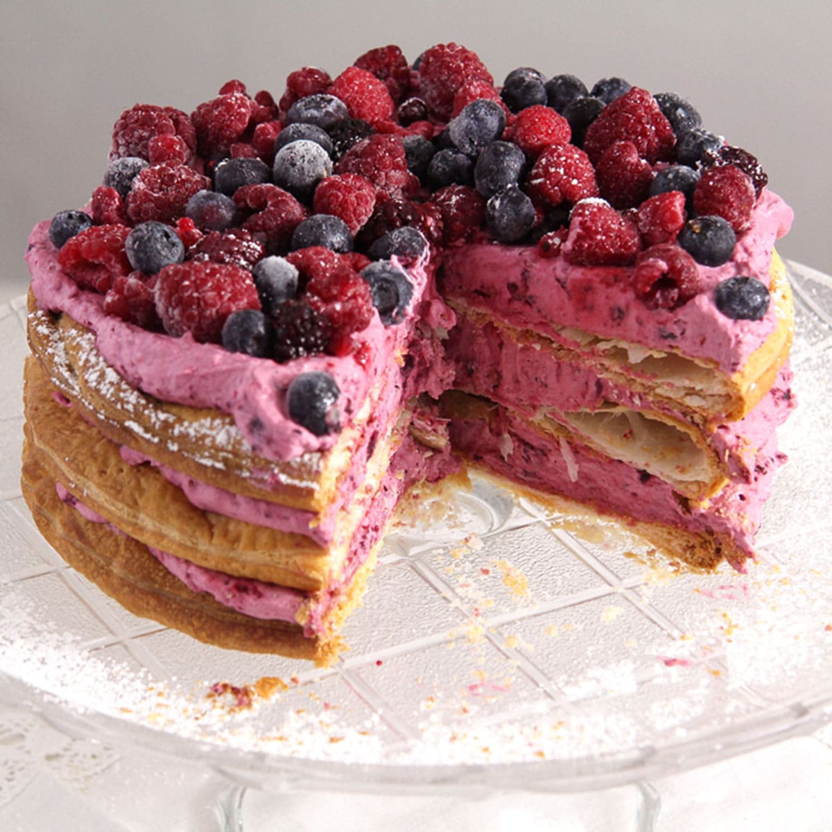 three-layered puff pastry cake cut to show the layers.