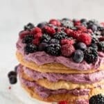 pin image with the title berry puff pastry cake.