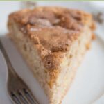 slice of apple cake facing to you with fork