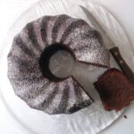 chocolate almond bundt cake on a platter