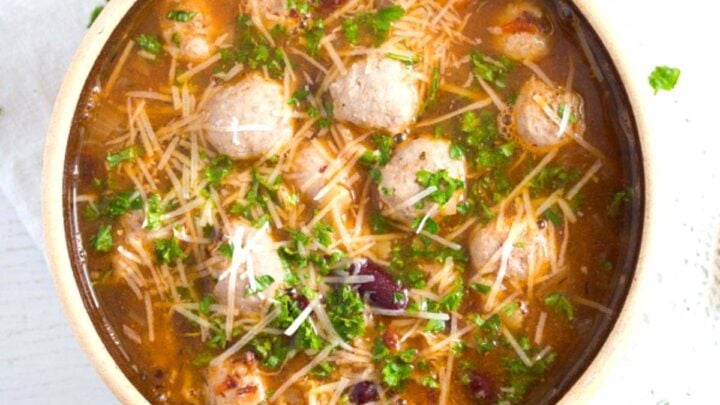bratwurst soup in a small earthen pot.