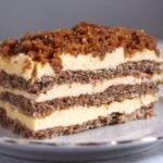 slice of walnut cake with buttercream