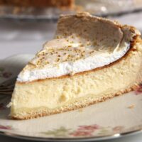 slice of german cheesecake with meringue topping