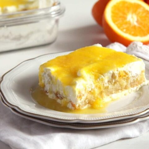 orange tiramisu slice on a plate