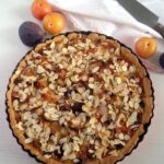 mixed fruit pie with almond topping in pie dish
