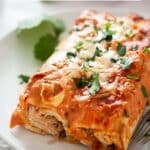 pinterest image with title for red sauce enchiladas.