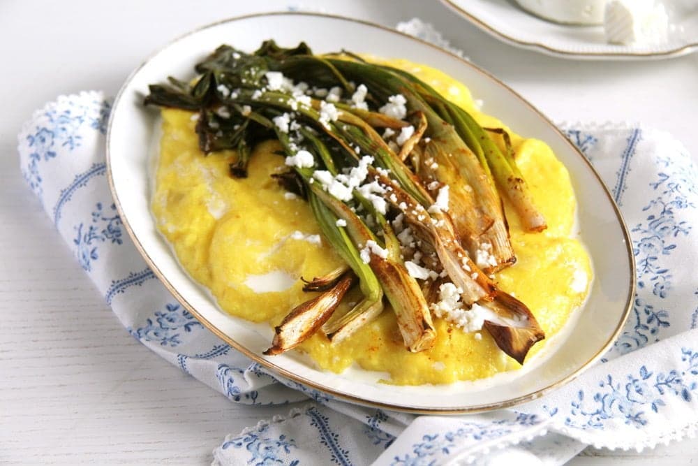 green onions on polenta with cheese 