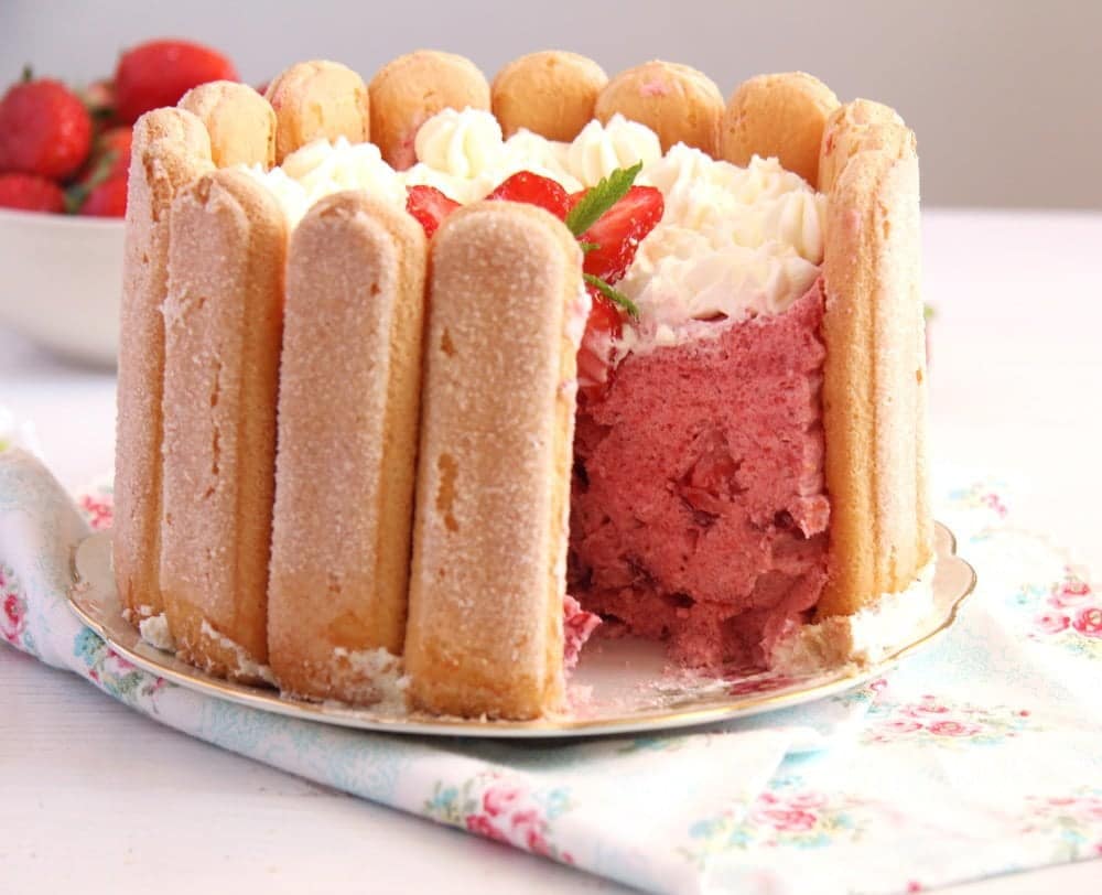 strawberry charlotte with fresh berries on the table