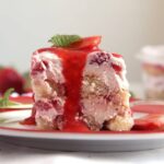 strawberry mascarpone dessert with ladyfingers on a plate