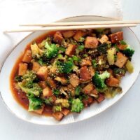 sweet and sour tofu with broccoli on a platter