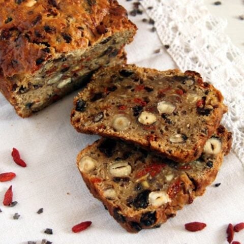 sliced sweet bread with fruit and nuts