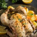 baked lemon chicken served with potatoes and carrots
