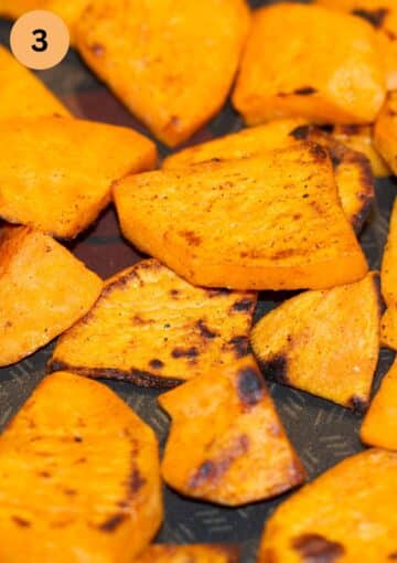 close up sweet potato slices browned at the edges.