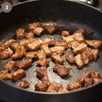 browning beef pieces for goulash in a pot.