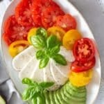 pin image with the title mozzarella tricolore salad.