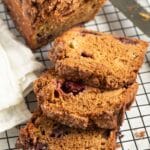 pin image with the title rhubarb blackberry loaf cake.