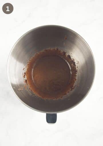 mixed brown sugar, eggs and oil in a bowl for making rhubarb blackberry cake.